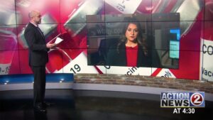 Image of Chris Roth in conversation with reporter Brittany Schmidt